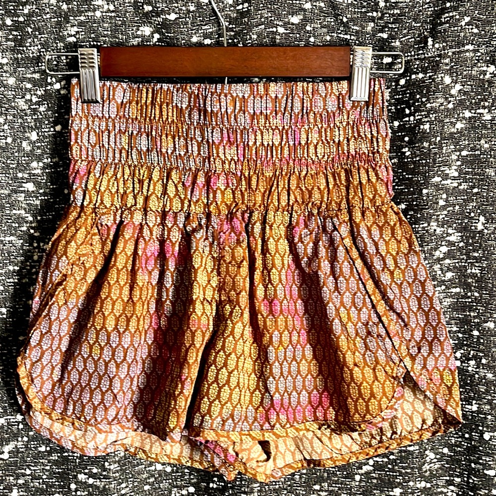 Super Snazzy Hippie Running Shorts! Built in underwear. Xtra Small but stretchy!